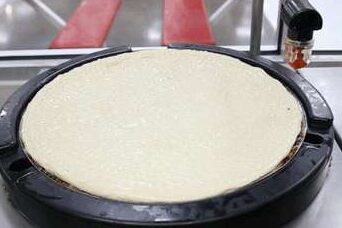 Cómo Costco hace su pizza - Thrillist